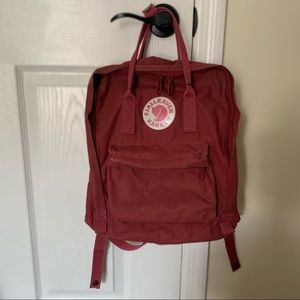 Fjallraven Kanken backpack in red brick